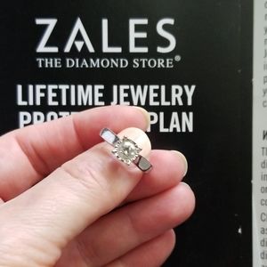 1 Carat diamond 14 K white gold engagement ring